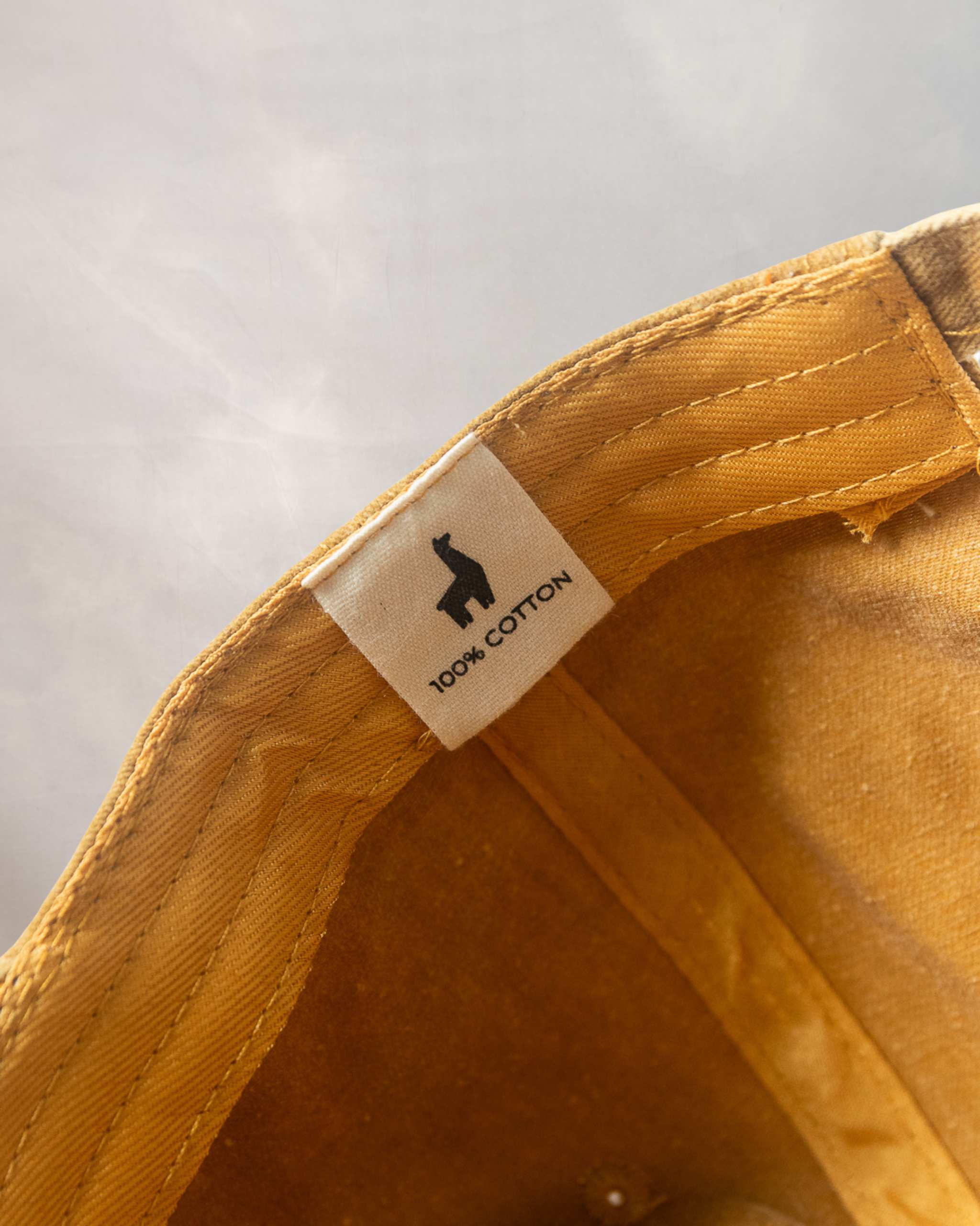 Gorra Qénido Amarilla